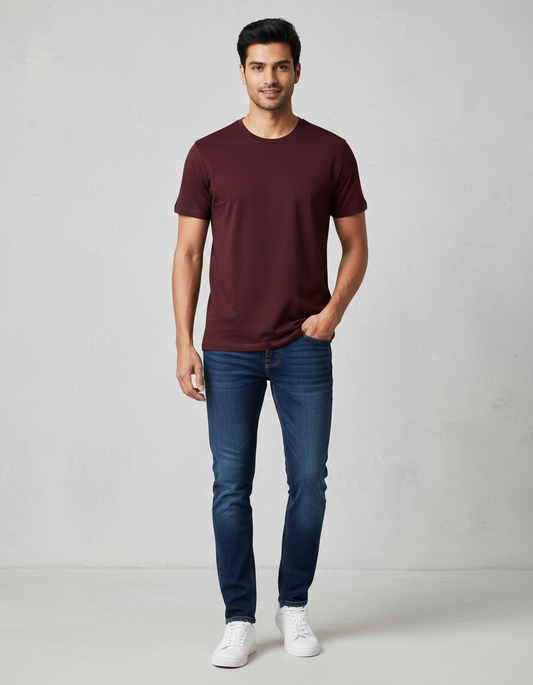 Indian model wearing maroon Unisex Supima T-shirt with jeans