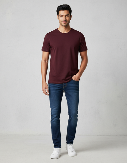 Indian model wearing maroon Unisex Supima T-shirt with jeans
